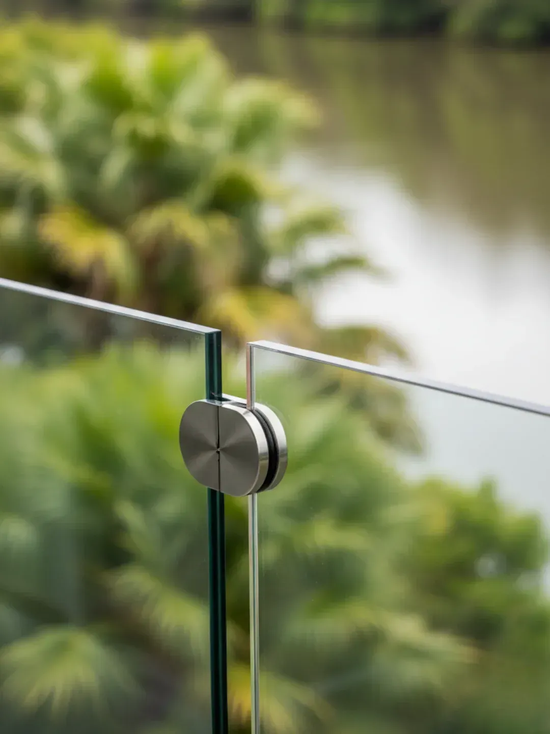 Inner-north Brisbane river humidity considerations for glass balustrade hardware in South Brisbane apartment balcony