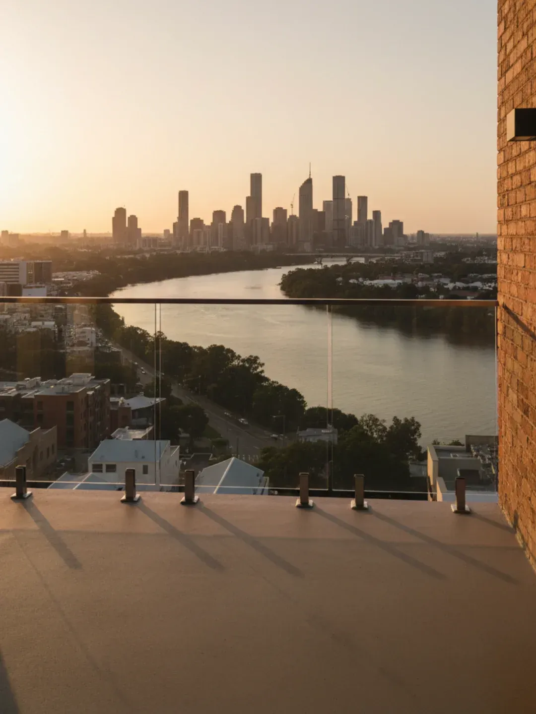 Modern frameless glass balustrades South Brisbane enhancing river and skyline views with safe compliant installation.